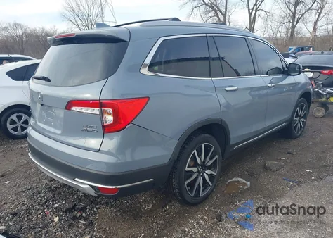 2022 Honda Pilot Awd Elite z USA, uszkodzony, nr VIN 5FNYF6H09NB050915